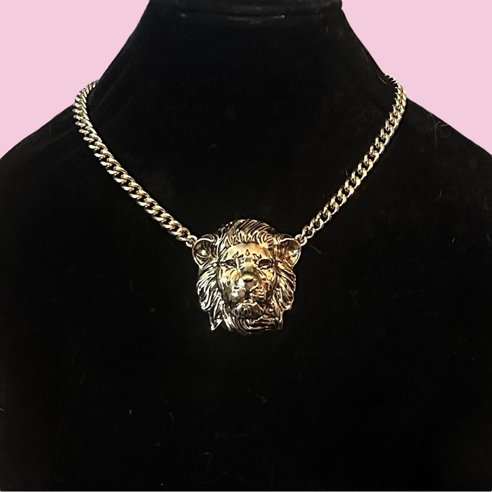 Chunky gold tone lions head necklace